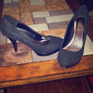 Black suede pumps
